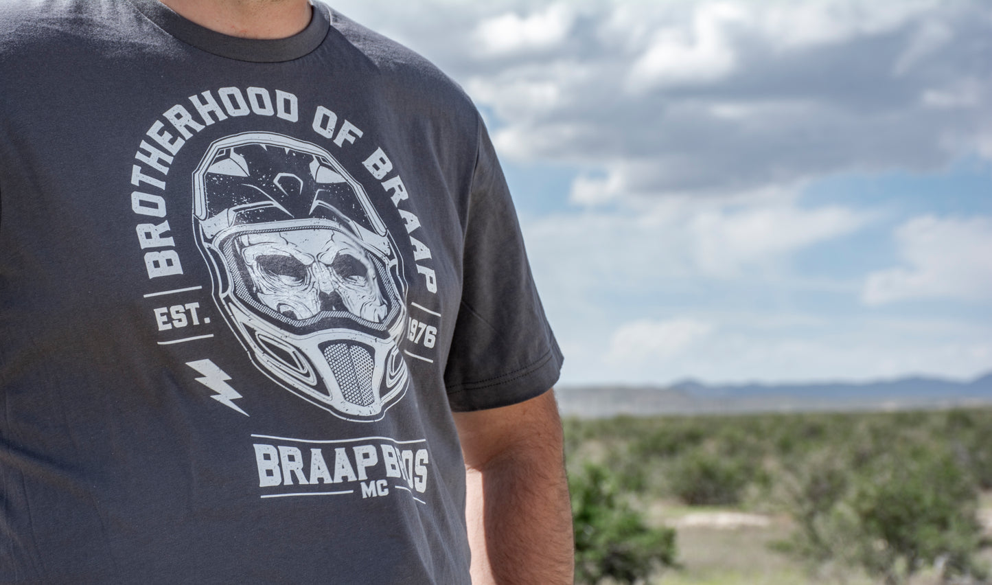 Close up of a person wearing a Brotherhood of Braap Shirt in the desert.